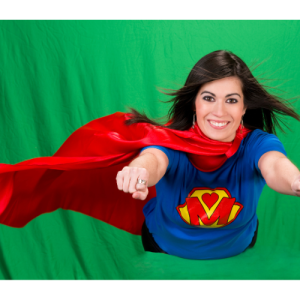 woman in superman suit in front of a green background